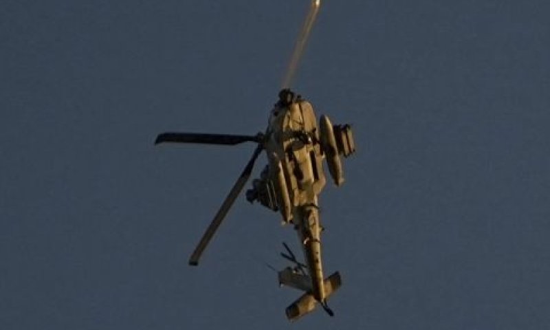 מסוק של צה"ל תוקף ברצועה [צילום: עאדל חנה/AP]