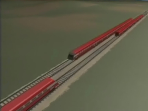 בתמונה: נהג הרכבת הנוסעת במסילה השמאלית (נוסעת לכיוון מטה) מבחין ברכבת הבאה ממולו (התחתונה), העומדת להתנגש ברכבת שלפניה [ערוץ 2]