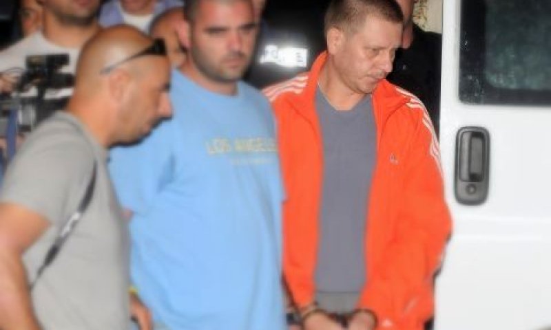 דמטרי קרליק משחזר את הרצח [צילום: פלאש 90]