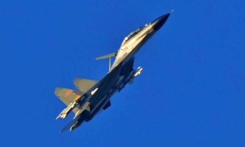 מטוס קרב J-11 סיני טס מעל לשטחה של טייוואן [צילום: נג האן גואן, AP]