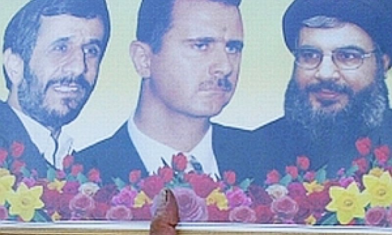 בכרזה: חסן נסראללה, בשאר אסד ומחמוד אחמדינג'אד