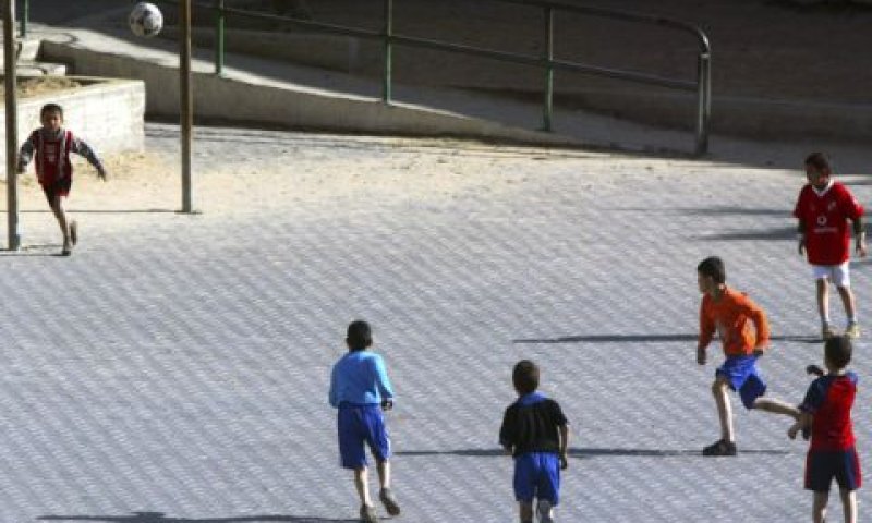 בנים במשחק כדורגל [צילום: עבד עבד/פלאש 90]