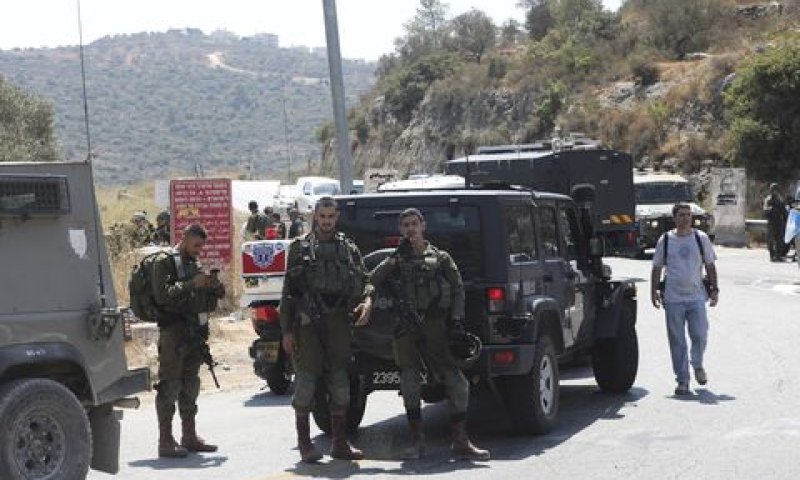 הפיגוע במעיין דני [צילום: מחמוד עיליאן/AP]