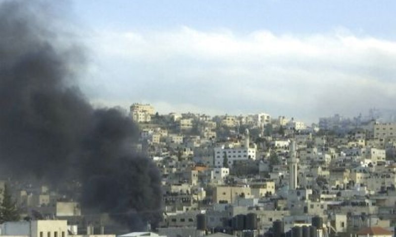 עשן מיתמר מעל ג'נין [צילום: AP]