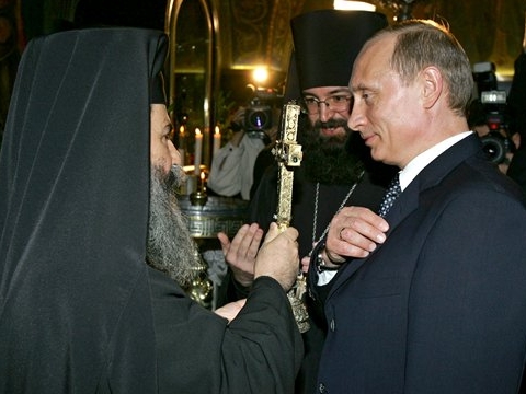 פוטין בכנסיית הקבר [AP]
