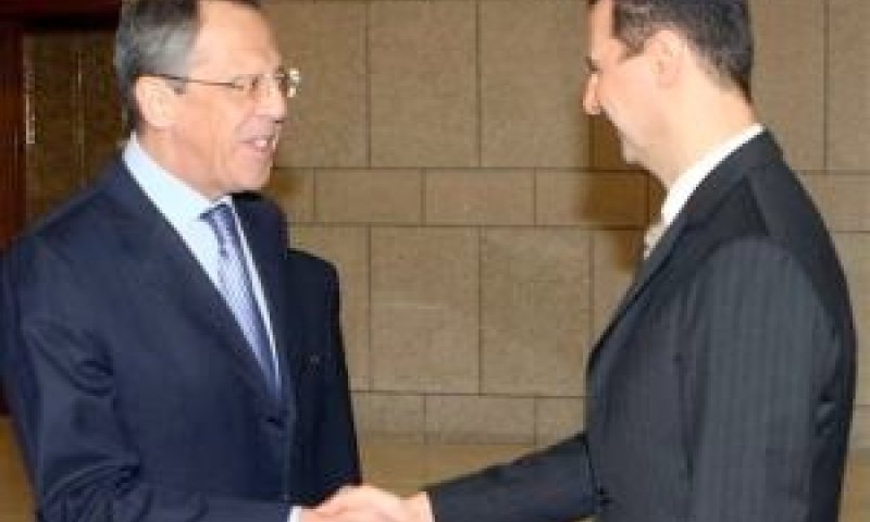 בשאר אסד עם סרגיי לברוב [צילום: AP]