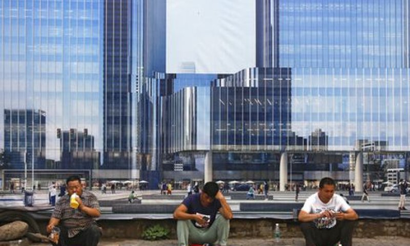 סכסוך על פועלים סינים [צילום: אנדי וונג, AP]