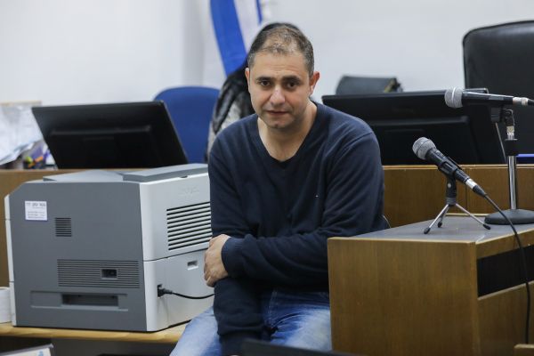 מלכה בעדותו במשפט פישר [צילום: יונתן זינדל/פלאש 90]