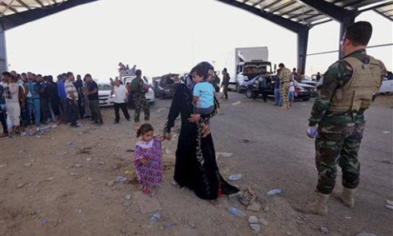 פליטים במוסול [צילום: AP]