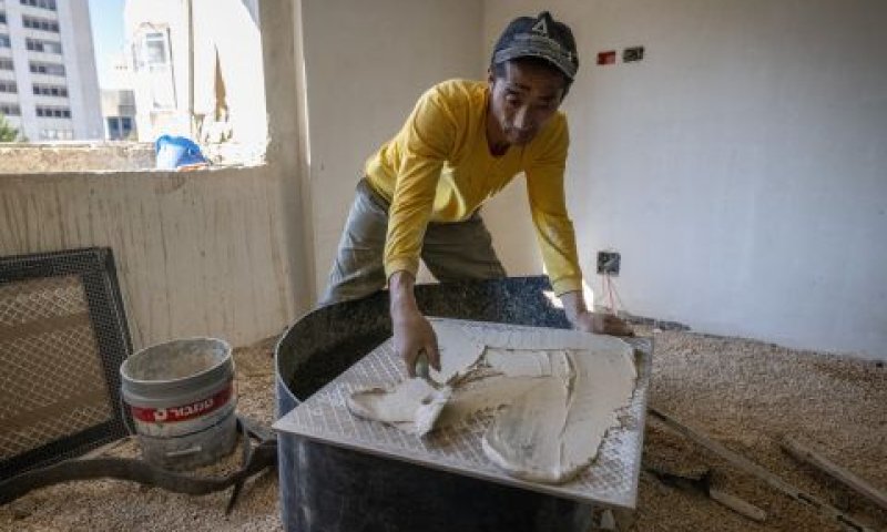 שכר הפועלים הסינים זינק פי שלושה [צילום: חיים גולדברג, פלאש 90]
