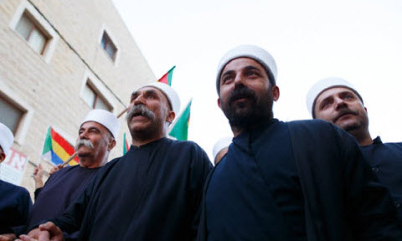 "סטירת לחי לעדה" [צילום: באסל אווידאת, פלאש 90]