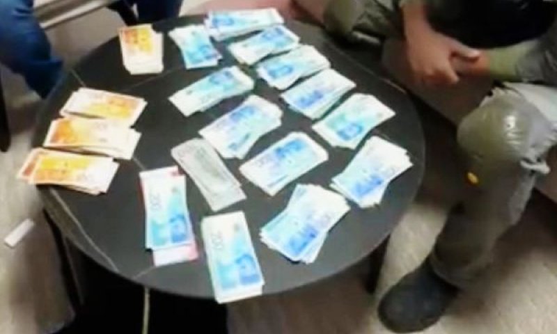תמונת הכסף שנתפס [צילום: דוברות המשטרה]