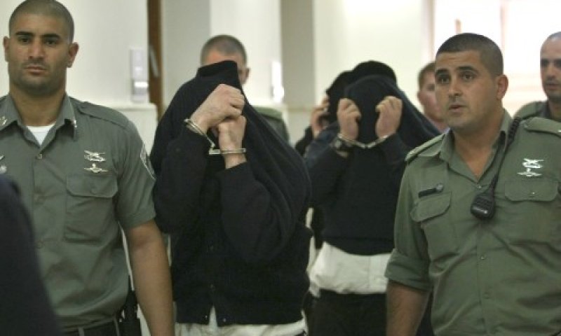 שניים מן המורשעים בבית המשפט [צילום: פלאש 90]